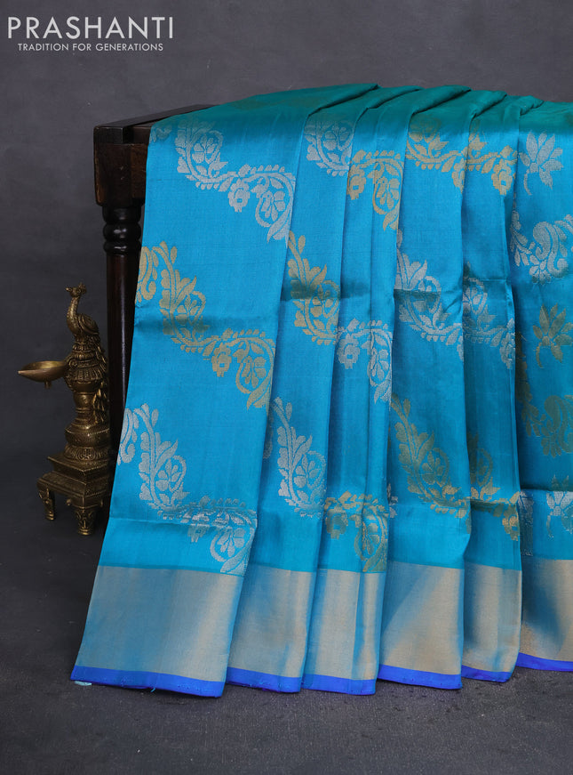 Pure uppada silk saree dual shade of teal bluish green and blue with allover silver & gold zari weaves and zari woven border