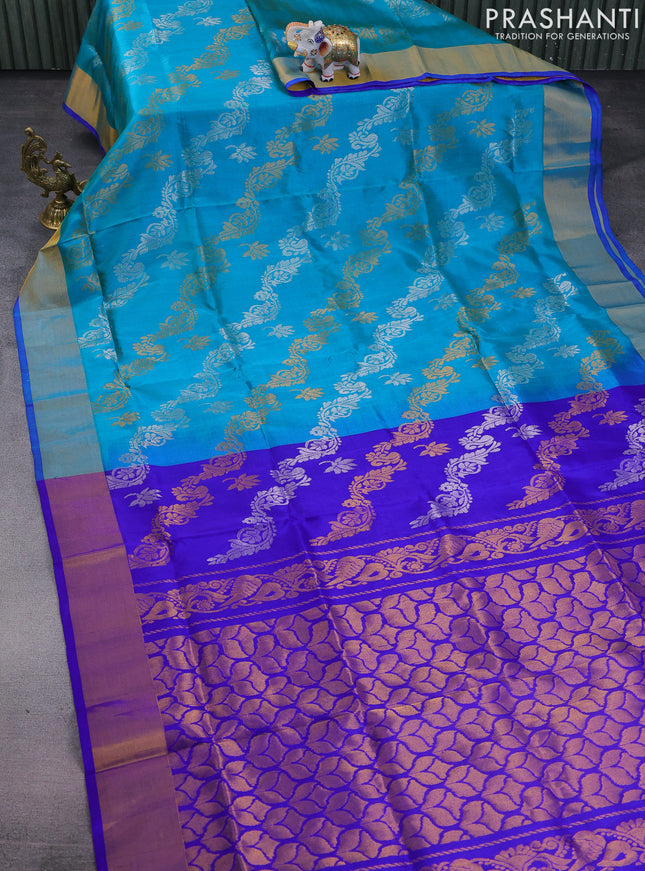 Pure uppada silk saree dual shade of teal bluish green and blue with allover silver & gold zari weaves and zari woven border