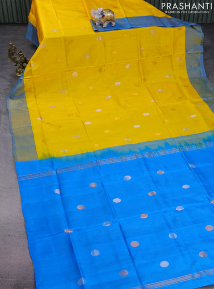 Pure uppada silk saree yellow and cs blue with silver & gold zari woven coin buttas and simple border