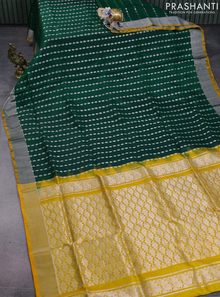 Pure uppada silk saree dark green and yellow with allover silver zari woven butta weaves and silver zari woven border