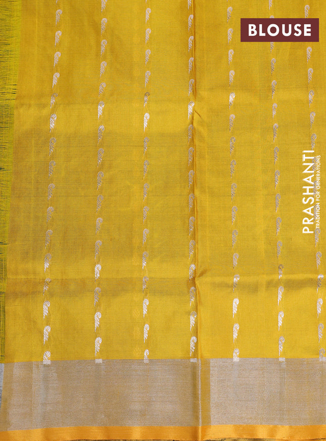 Pure uppada silk saree dark green and yellow with allover silver zari woven butta weaves and silver zari woven border