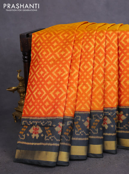Rajkot patola silk saree orange and black with allover ikat weaves and zari woven border