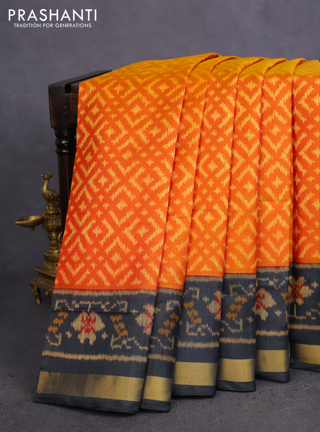 Rajkot patola silk saree orange and black with allover ikat weaves and zari woven border
