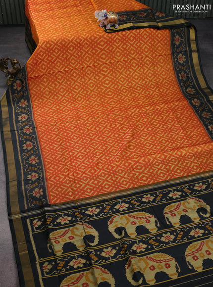 Rajkot patola silk saree orange and black with allover ikat weaves and zari woven border