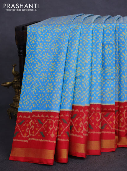 Rajkot patola silk saree light blue and red with allover ikat weaves and zari woven border