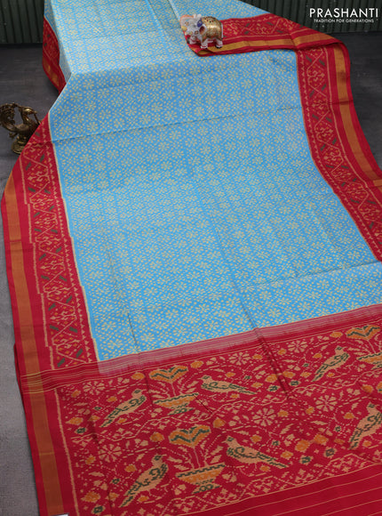 Rajkot patola silk saree light blue and red with allover ikat weaves and zari woven border