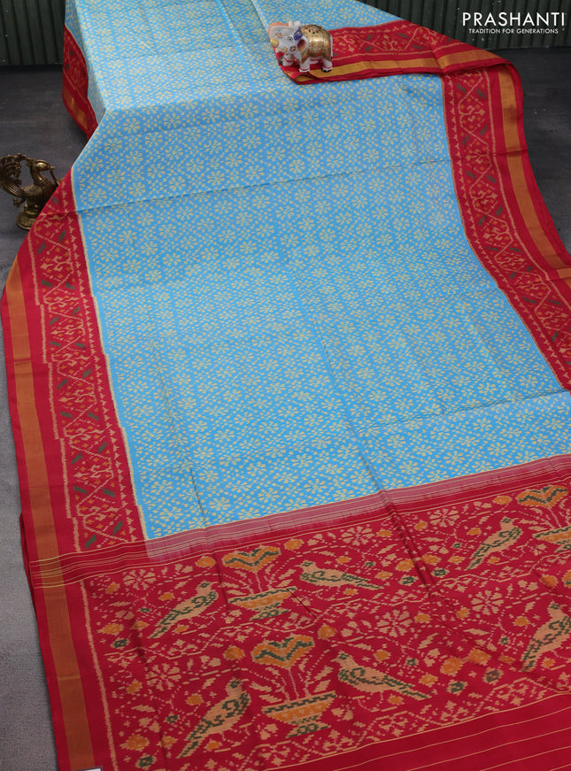Rajkot patola silk saree light blue and red with allover ikat weaves and zari woven border