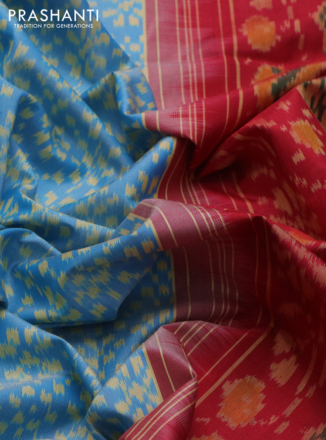 Rajkot patola silk saree light blue and red with allover ikat weaves and zari woven border