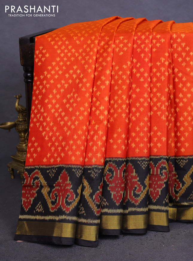 Rajkot patola silk saree orange and black with allover ikat weaves and zari woven border