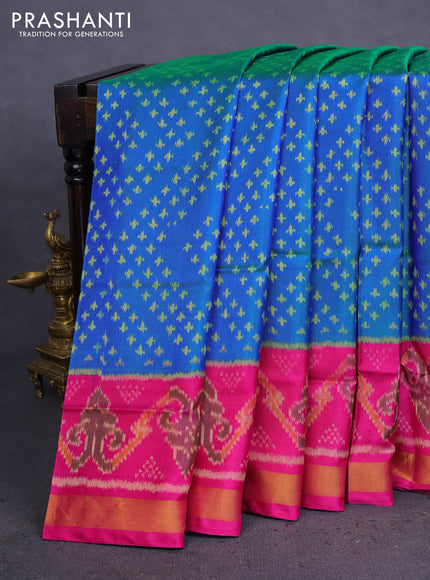 Rajkot patola silk saree dual shade of teal blue and magenta pink with allover ikat weaves and zari woven border