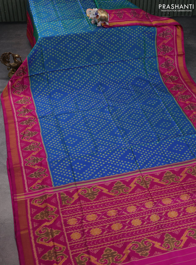 Rajkot patola silk saree dual shade of teal blue and magenta pink with allover ikat weaves and zari woven border