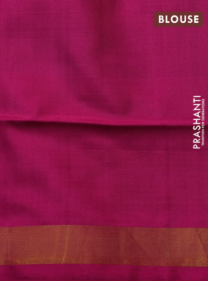 Rajkot patola silk saree dual shade of teal blue and magenta pink with allover ikat weaves and zari woven border