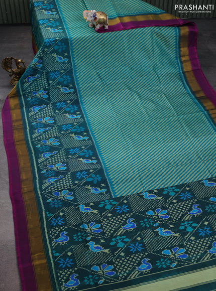 Rajkot patola silk saree teal blue and peacock green with allover ikat weaves and zari woven border