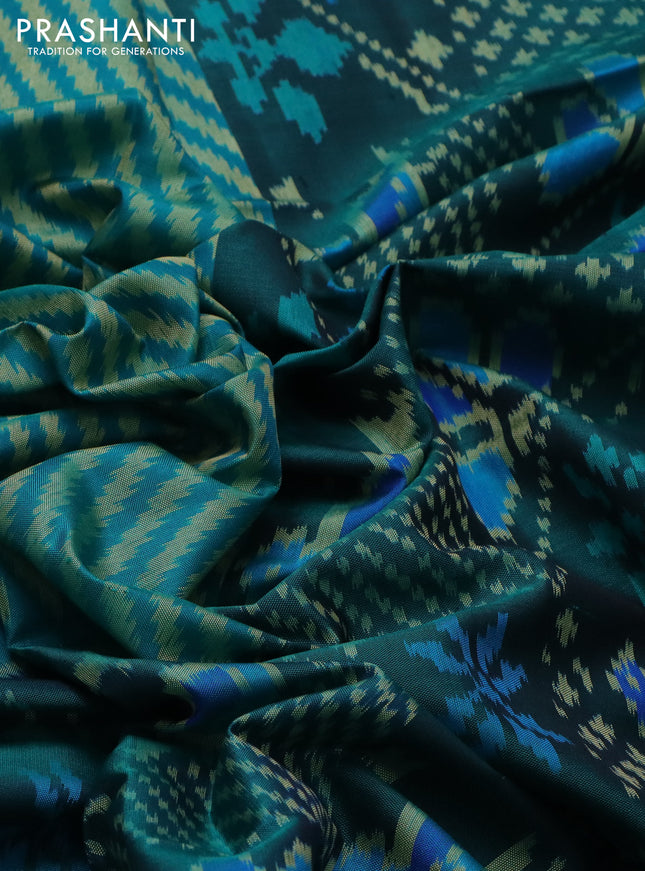 Rajkot patola silk saree teal blue and peacock green with allover ikat weaves and zari woven border