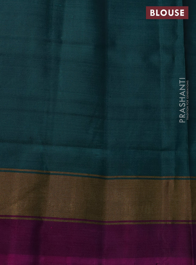 Rajkot patola silk saree teal blue and peacock green with allover ikat weaves and zari woven border