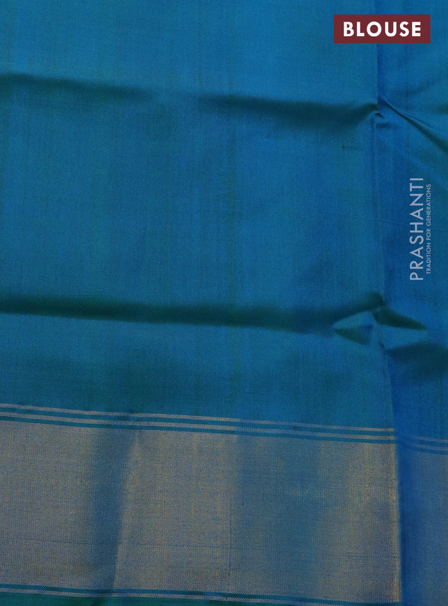 Rajkot patola silk saree dual shade teal bluish green with allover ikat weaves and zari woven border
