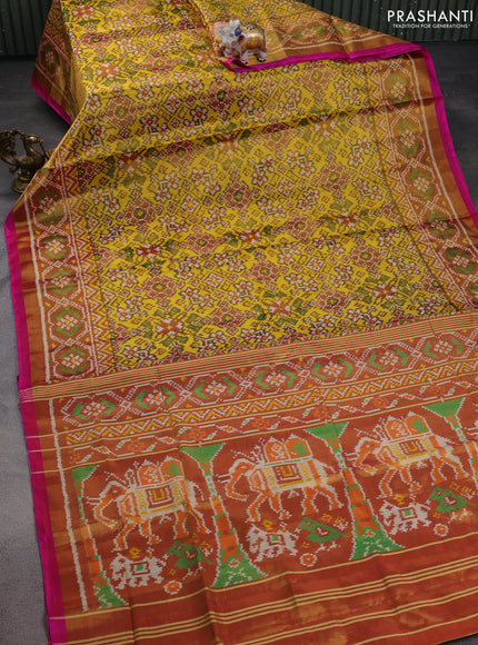 Rajkot patola ttissue silk saree yellow and gold with allover ikat weaves and zari woven border