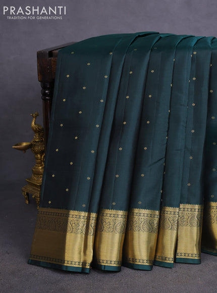Pure kanchipuram silk saree bottle green and dual shade of orange with allover zari woven 1000 buttas and rich zari woven border