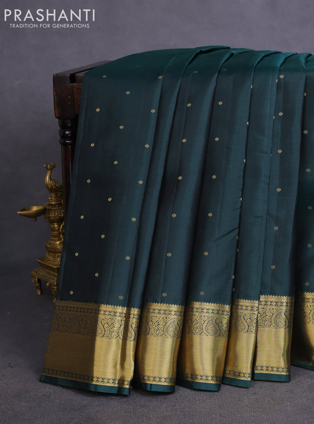 Pure kanchipuram silk saree bottle green and dual shade of orange with allover zari woven 1000 buttas and rich zari woven border