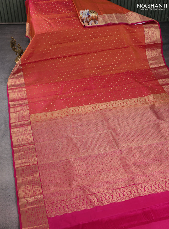 Pure kanchipuram silk saree dual shade of mustard yellowish pink and pink with allover zari woven 1000 buttas and zari woven border