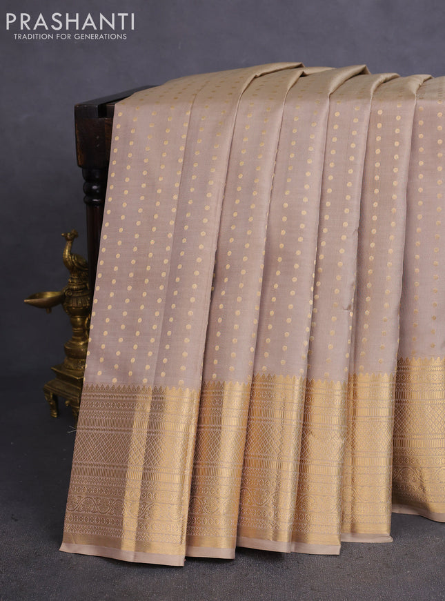 Pure kanchipuram silk saree beige and pink with allover zari woven 1000 buttas and zari woven border