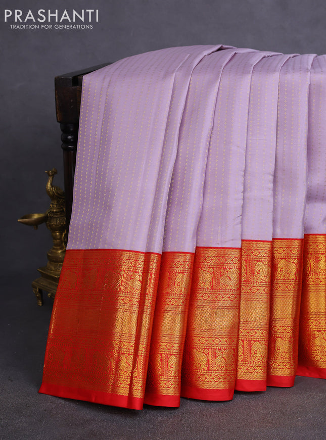 Pure kanchipuram silk saree pastel lavender and red with allover zari woven 1000 butta weaves and long zari woven korvai border