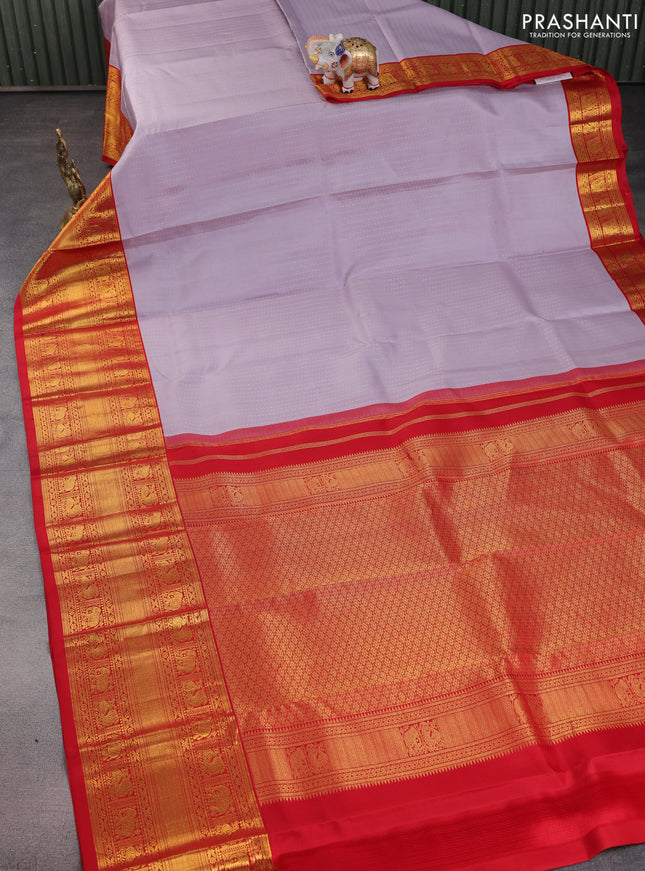 Pure kanchipuram silk saree pastel lavender and red with allover zari woven 1000 butta weaves and long zari woven korvai border