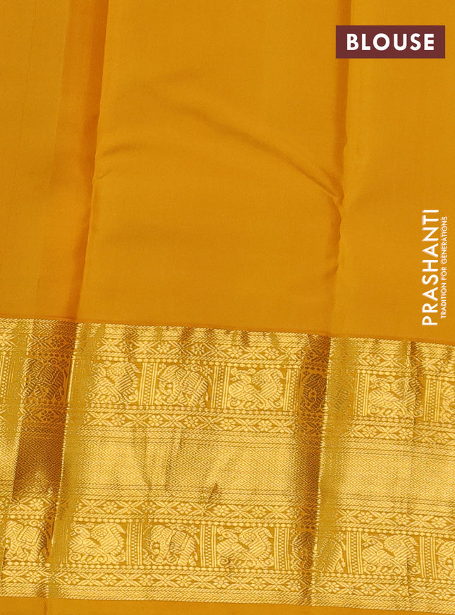 Pure kanchipuram silk saree bottle green and mustard yellow with allover zari woven 1000 butta weaves and long zari woven korvai border