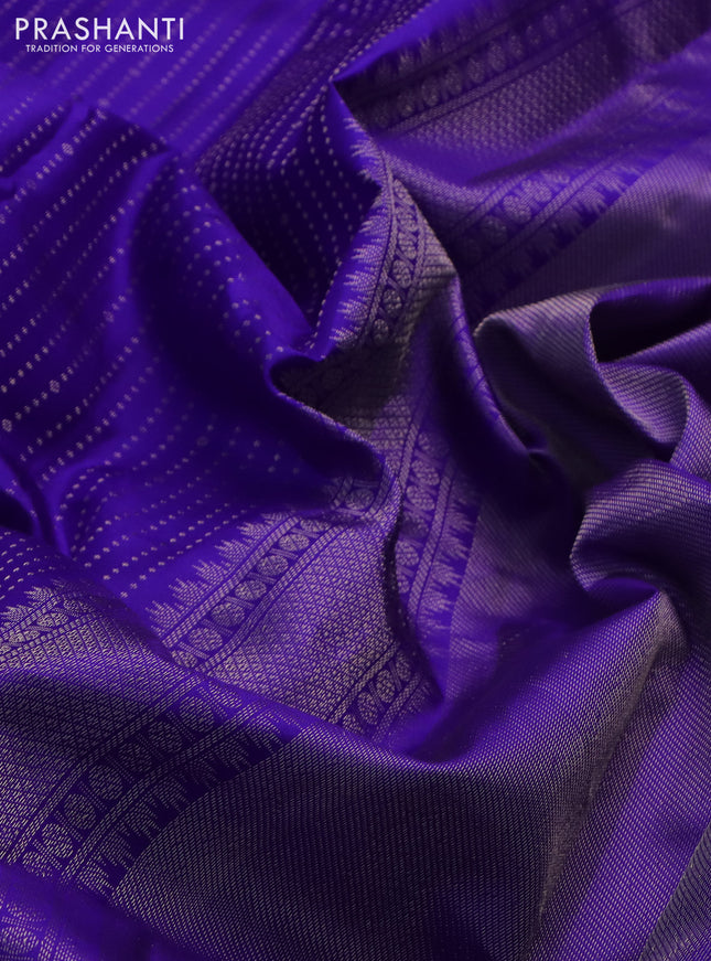 Pure kanchipuram silk saree blue with allover silver zari woven butta weaves and long rich zari woven border