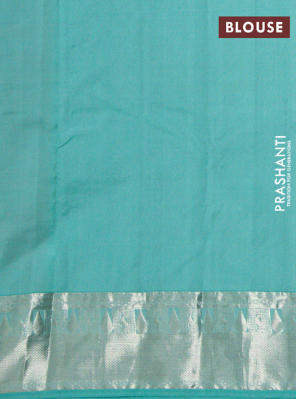 Pure kanchipuram silk saree dual shade of pinksh orange and teal blue with allover silver zari woven 1000 butta weaves and rich zari woven border