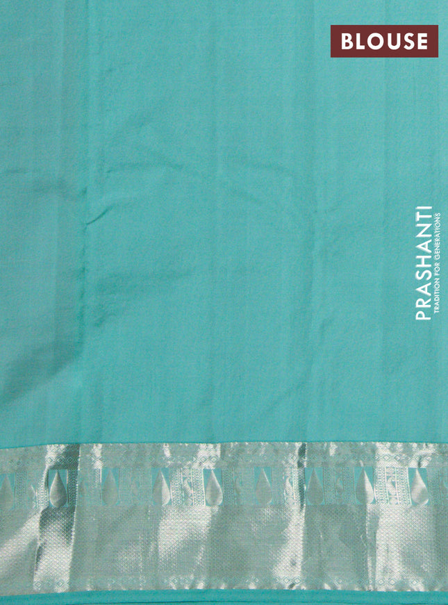 Pure kanchipuram silk saree dual shade of pinksh orange and teal blue with allover silver zari woven 1000 butta weaves and rich zari woven border