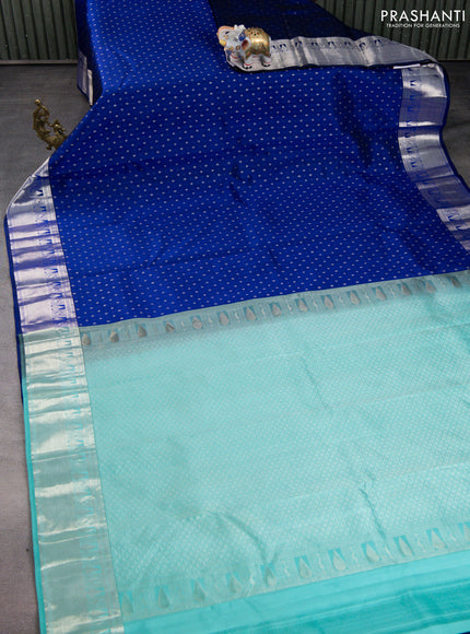 Pure kanchipuram silk saree blue and teal blue with allover silver zari woven 1000 butta weaves and rich zari woven border