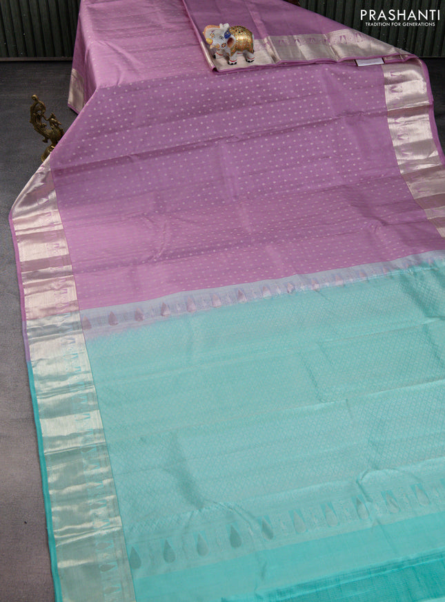 Pure kanchipuram silk saree lavender and teal blue with allover silver zari woven 1000 butta weaves and rich zari woven border