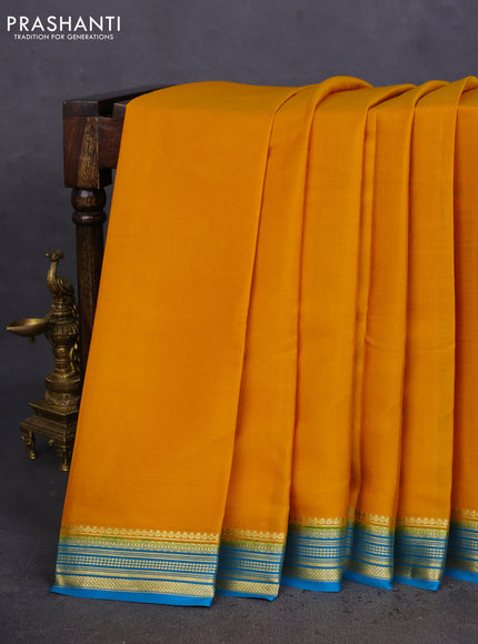 Pure mysore silk saree mango yellow and cs blue with plain body and zari woven border