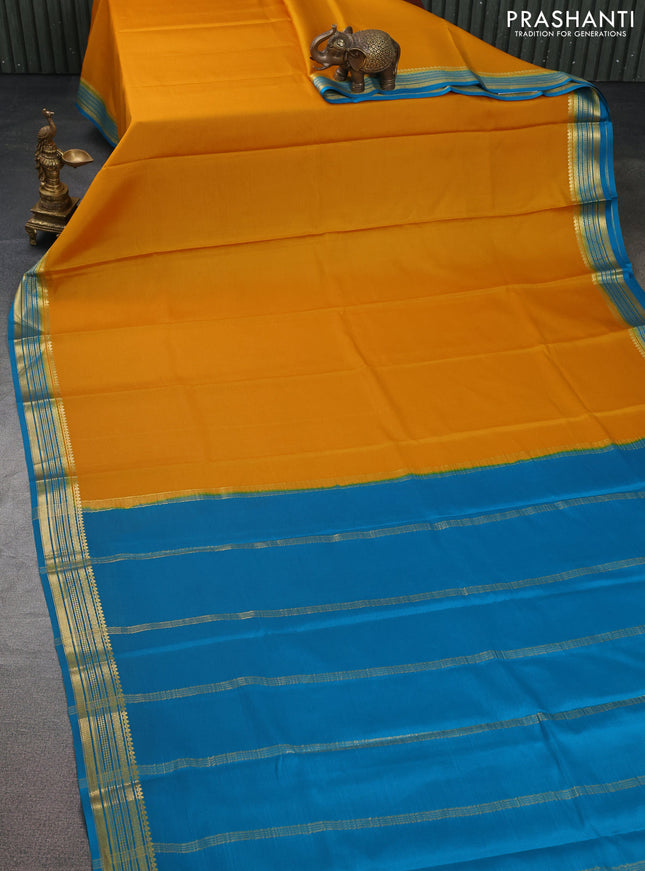 Pure mysore silk saree mango yellow and cs blue with plain body and zari woven border