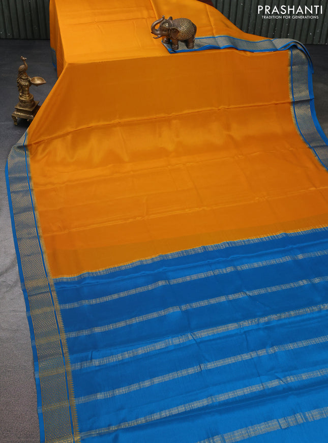 Pure mysore silk saree mustard yellow and cs blue with plain body and zari woven border