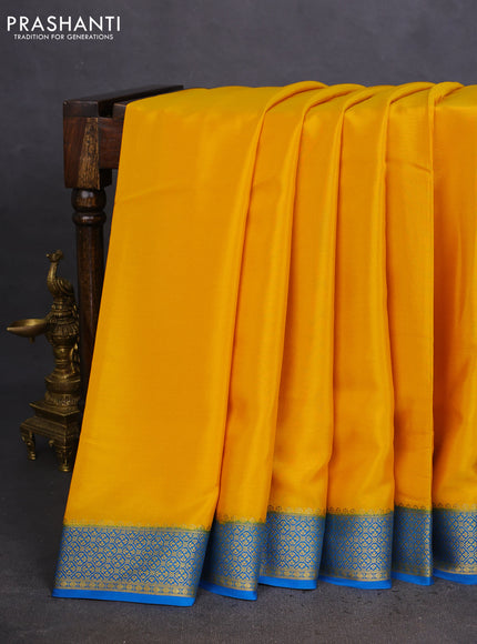 Pure mysore silk saree mustard yellow and cs blue with plain body and zari woven border