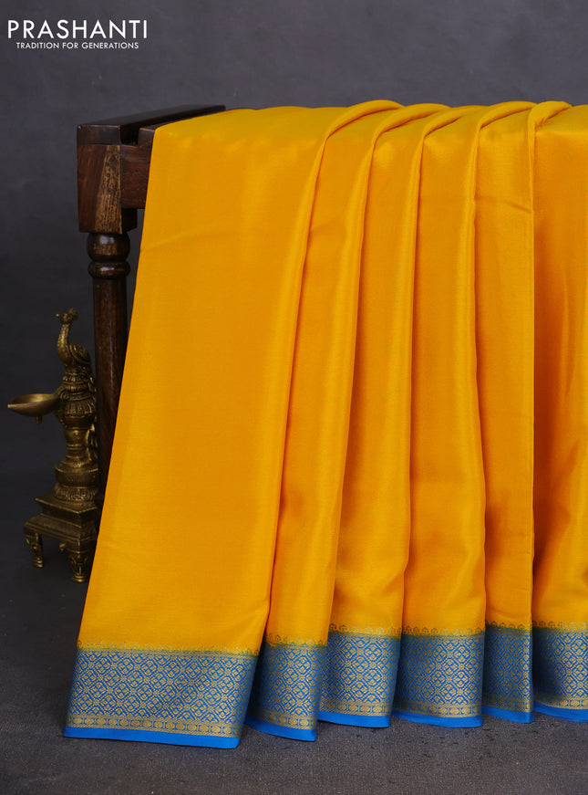 Pure mysore silk saree mustard yellow and cs blue with plain body and zari woven border