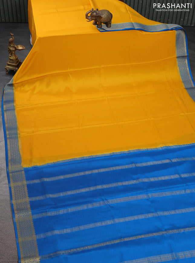 Pure mysore silk saree mustard yellow and cs blue with plain body and zari woven border