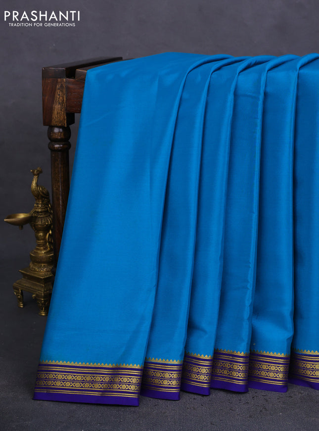 Pure mysore silk saree peacock blue and blue with plain body and zari woven border