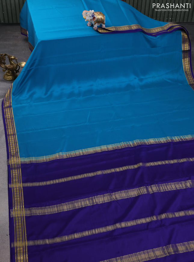 Pure mysore silk saree peacock blue and blue with plain body and zari woven border