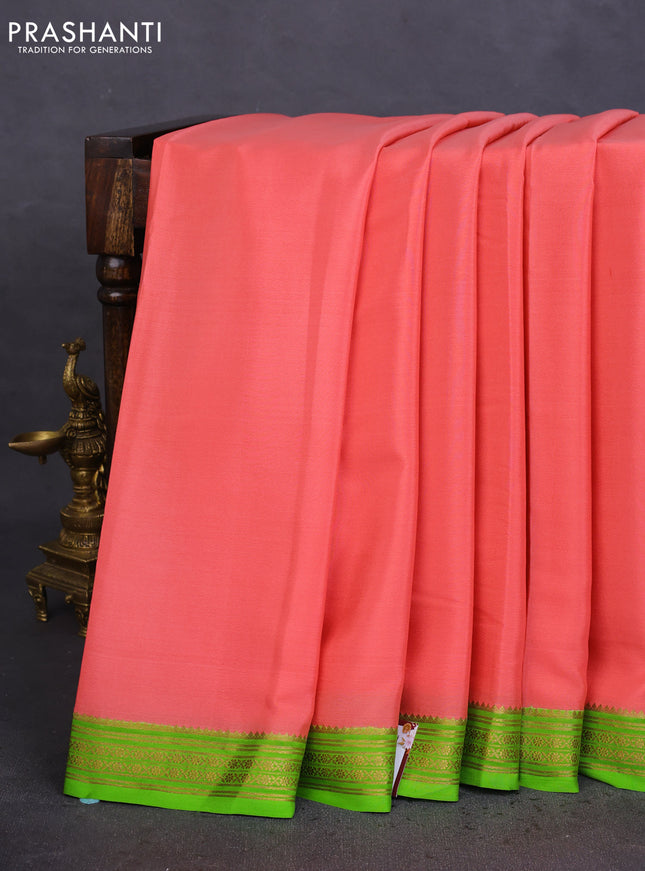 Pure mysore silk saree peach shade and light green with plain body and zari woven border