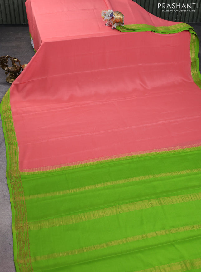 Pure mysore silk saree peach shade and light green with plain body and zari woven border