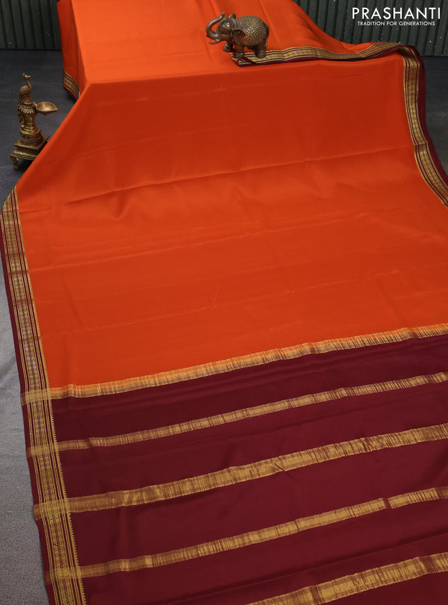 Pure mysore silk saree orange and maroon with plain body and zari woven border