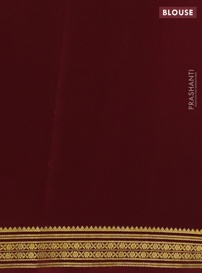 Pure mysore silk saree orange and maroon with plain body and zari woven border