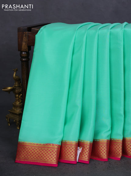 Pure mysore silk saree teal green and pink with plain body and zari woven border