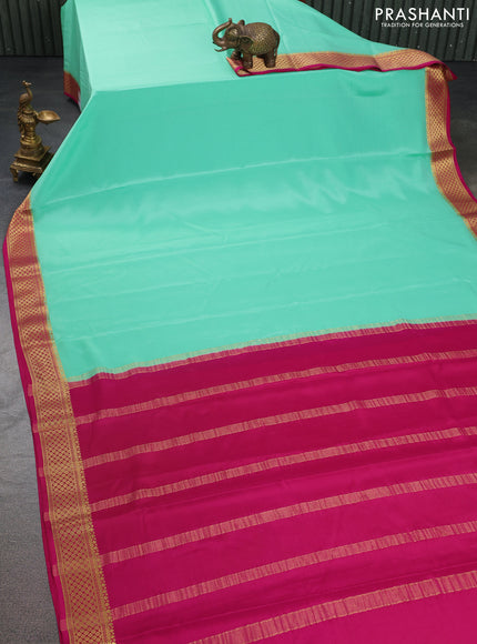Pure mysore silk saree teal green and pink with plain body and zari woven border