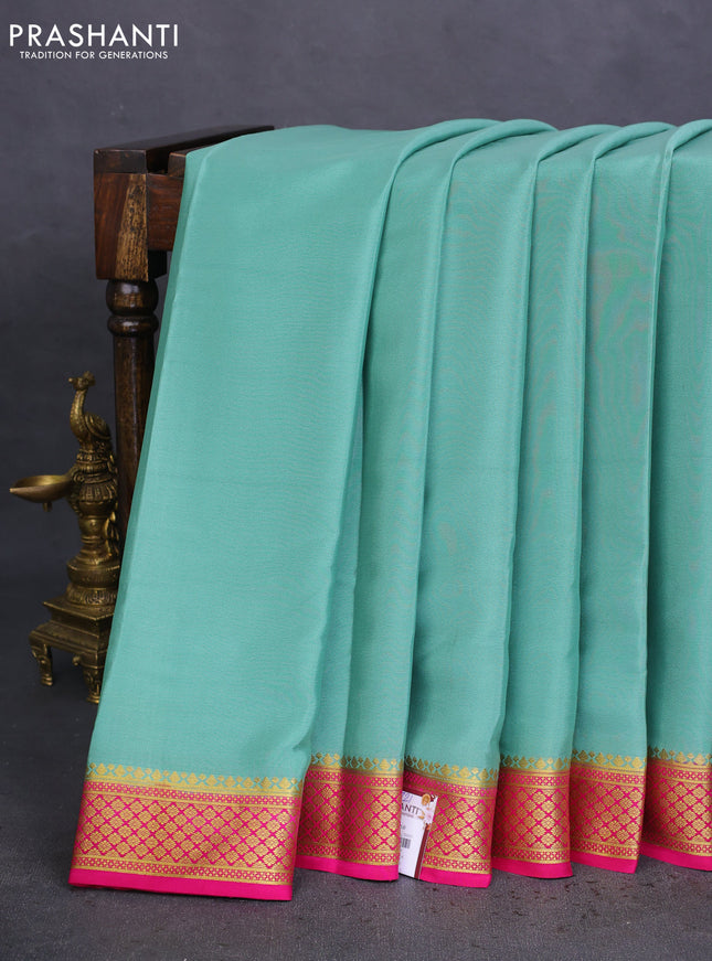 Pure mysore silk saree pastel green and pink with plain body and zari woven border