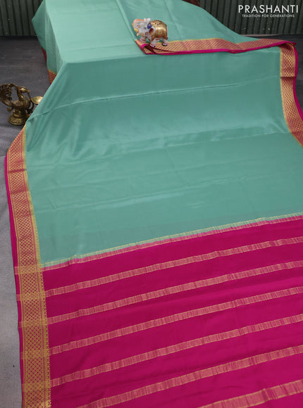 Pure mysore silk saree pastel green and pink with plain body and zari woven border
