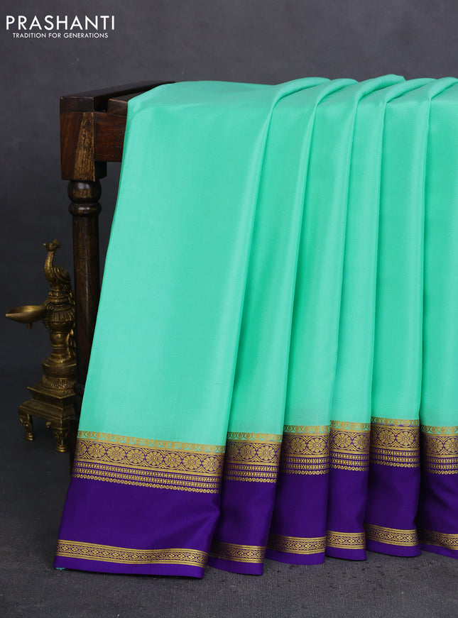 Pure mysore silk saree teal green and violet with plain body and rettapet zari woven border